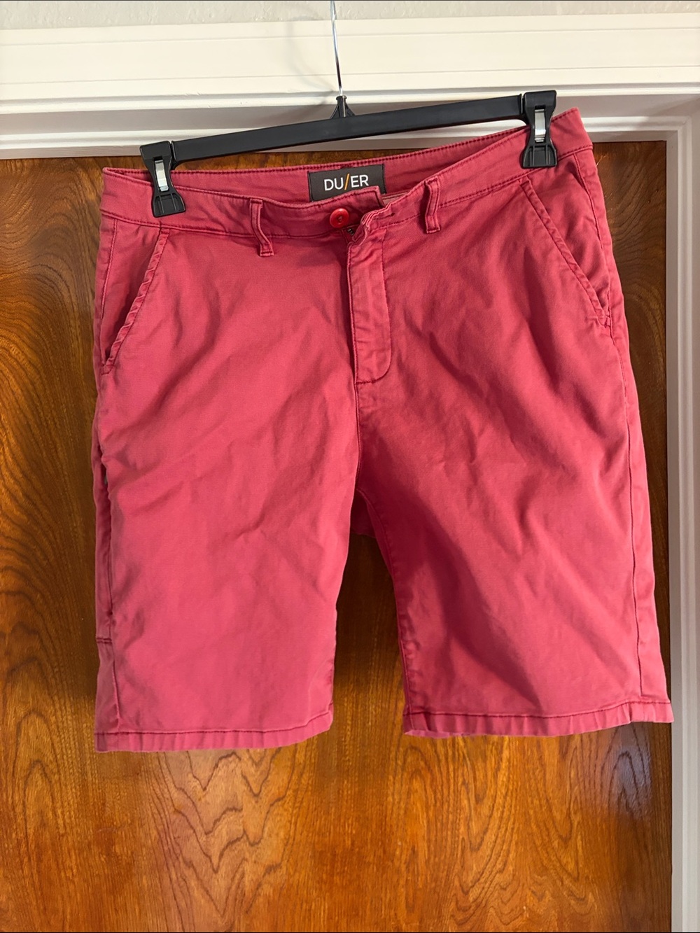 DU/ER Men's Flat Front Shorts in Coral Red